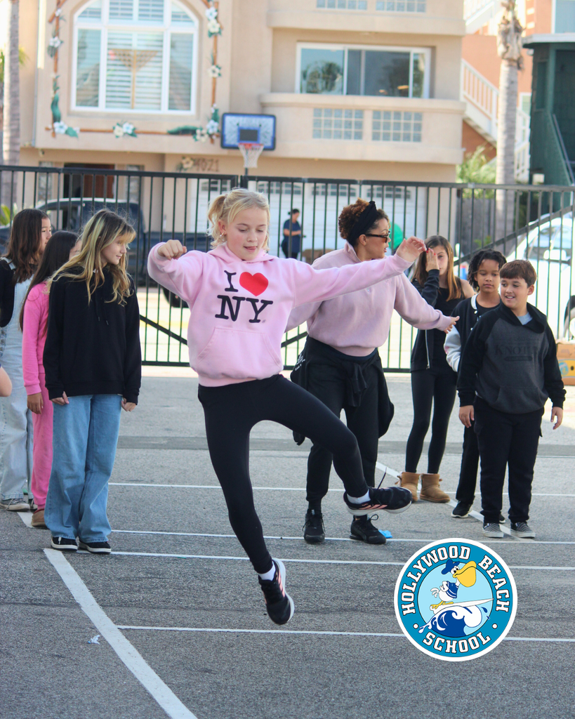 Ms.Jenna teaching line dancing to Ms. Thompson's 5th grade class.  