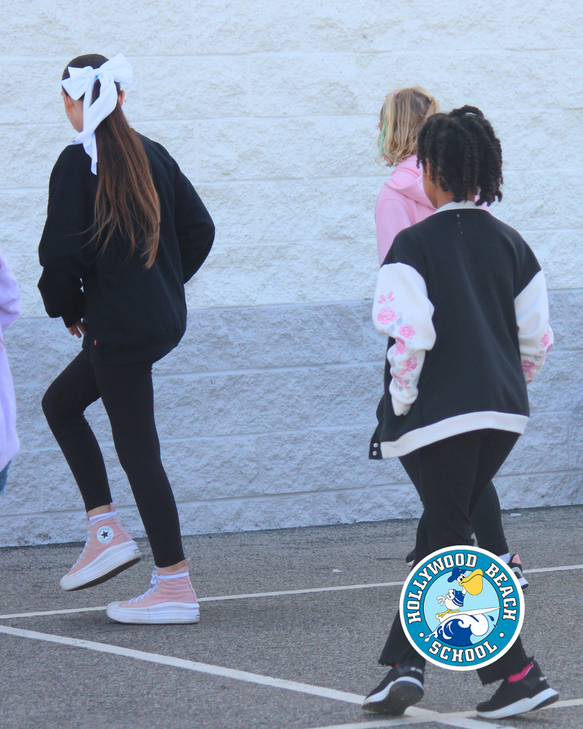 Ms.Jenna teaching line dancing to Ms. Thompson's 5th grade class.  