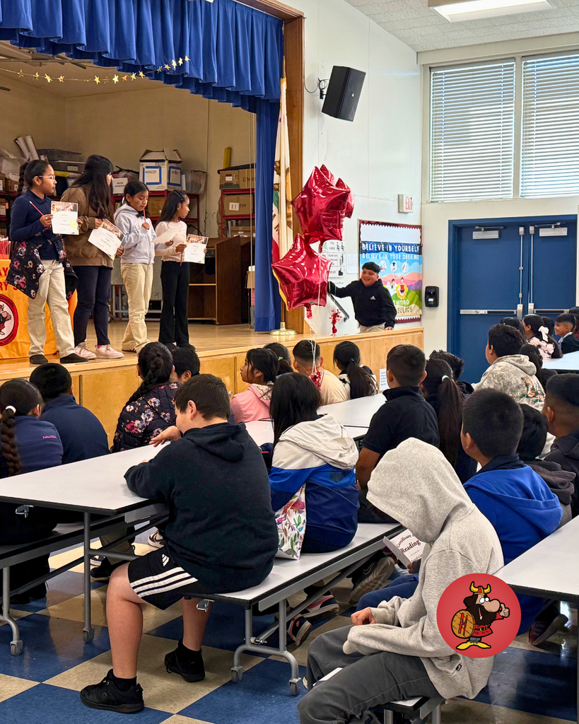 Students being honored with certificates