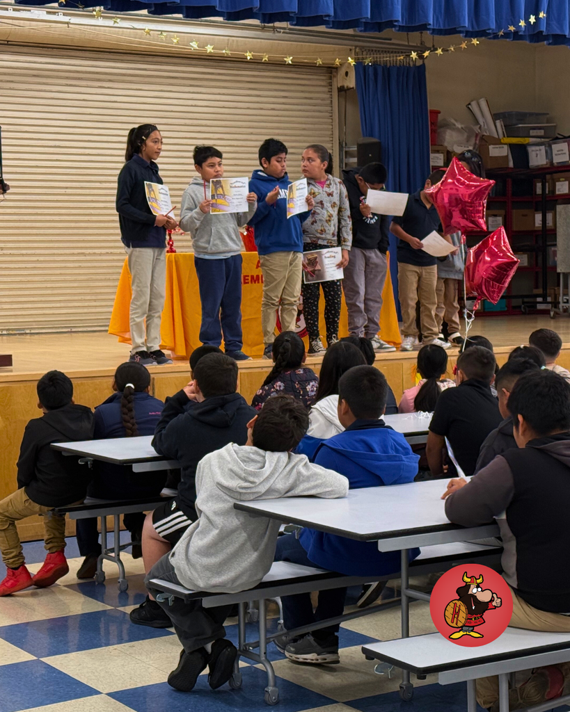 Students being honored with certificates