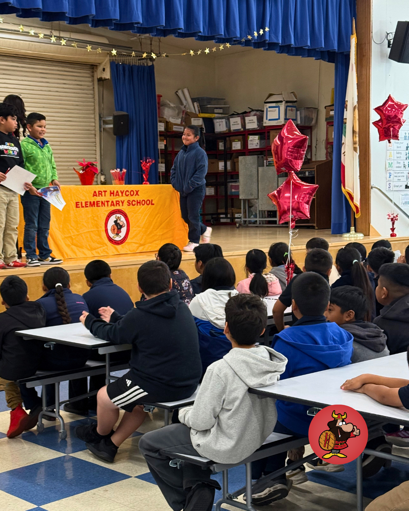 Students being honored with certificates