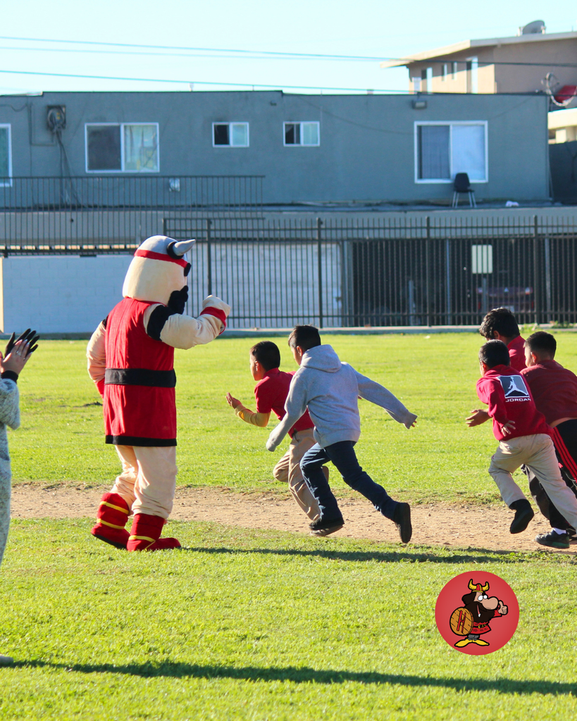 viking cheering students on while they run
