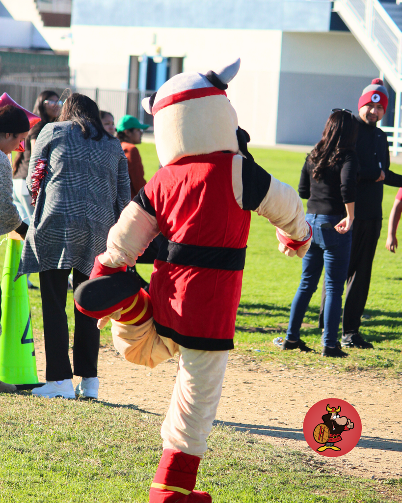 hiking mascot stretching for race