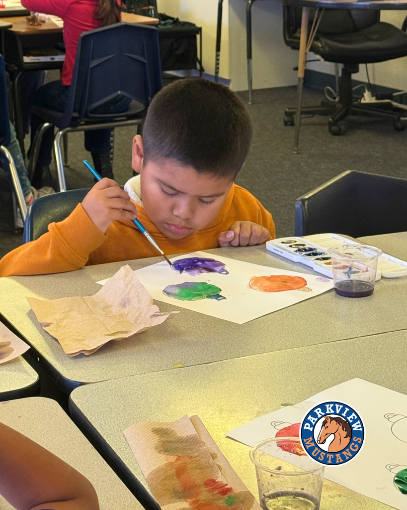 Mrs. Guerrero’s 1st graders painting