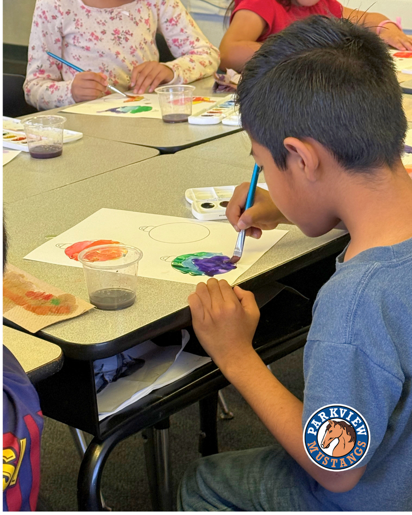 Mrs. Guerrero’s 1st graders painting