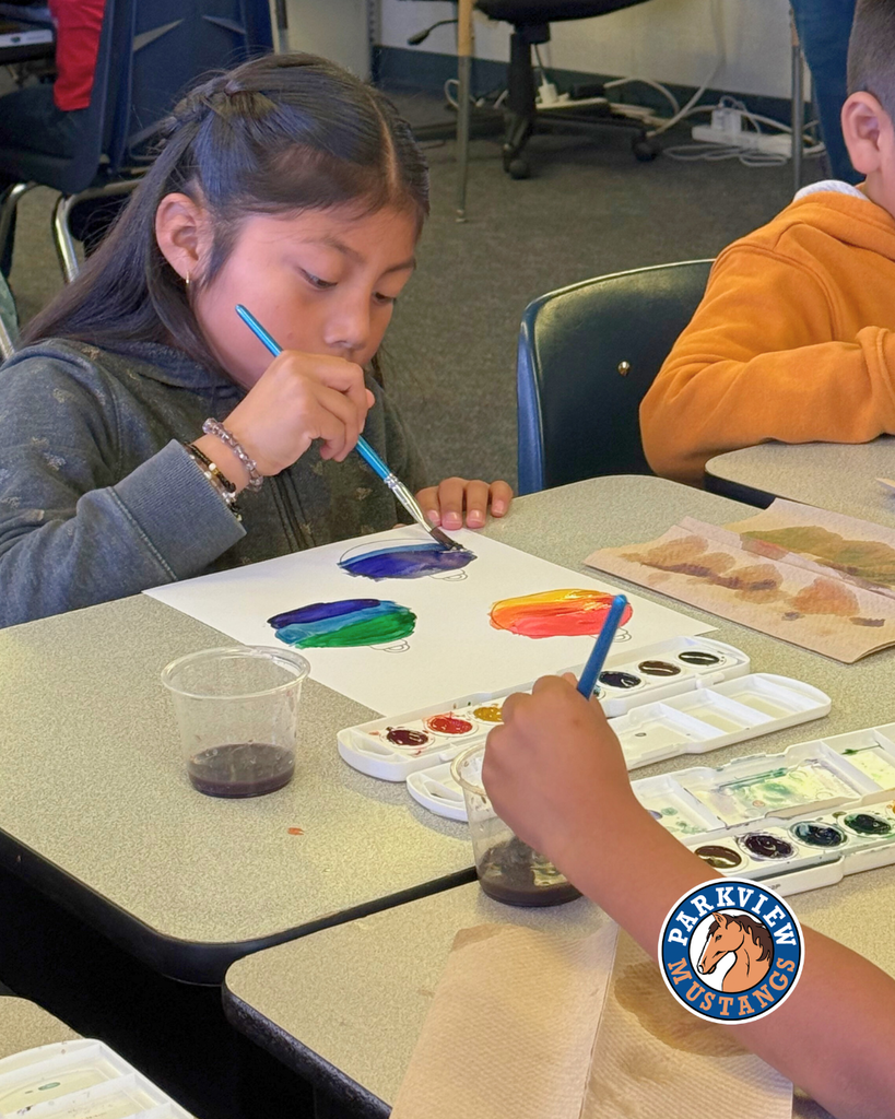 Mrs. Guerrero’s 1st graders painting