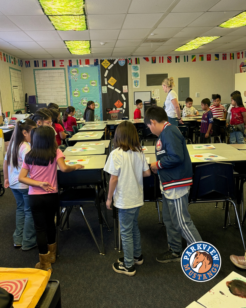 Mrs. Guerrero’s 1st graders painting