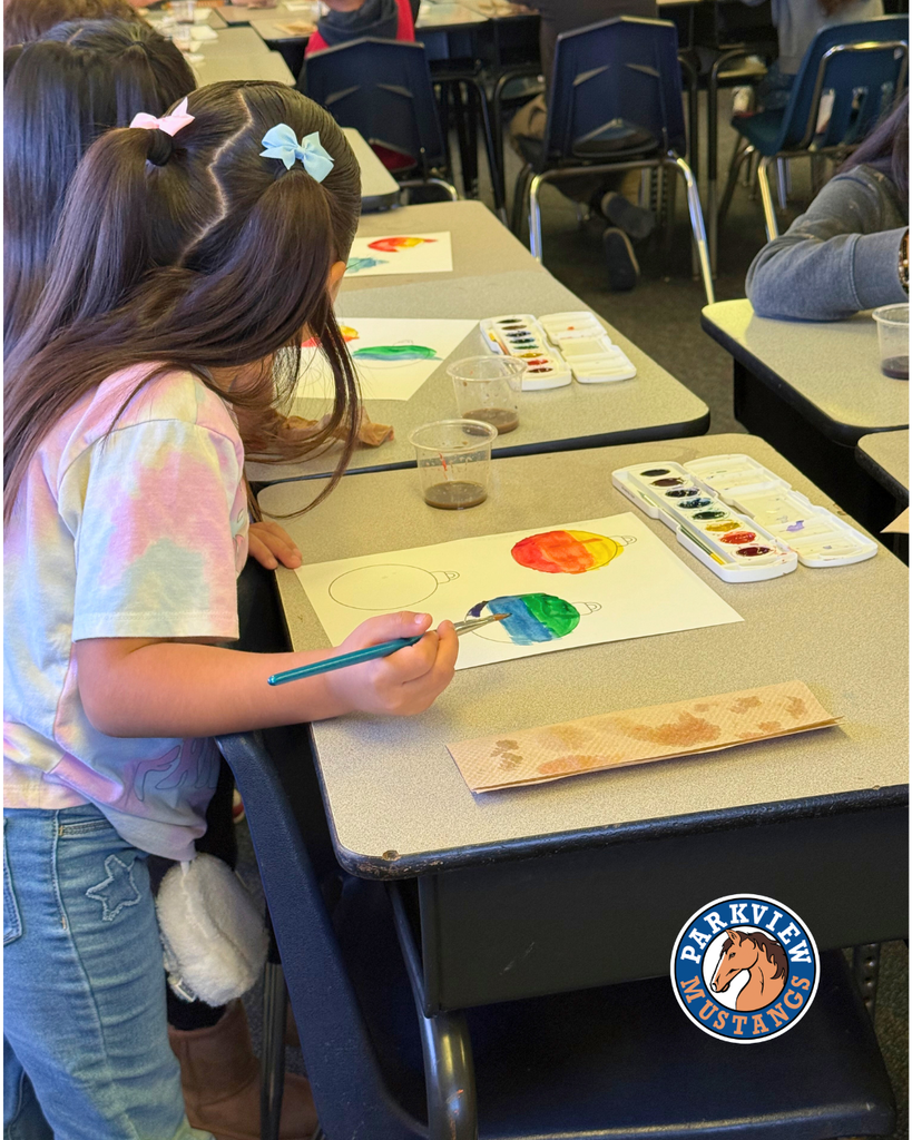 Mrs. Guerrero’s 1st graders painting