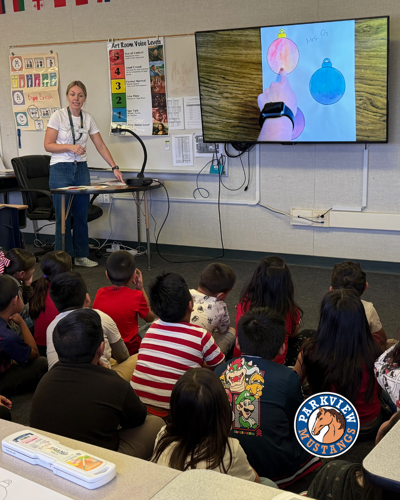 Mrs. Guerrero’s 1st graders painting