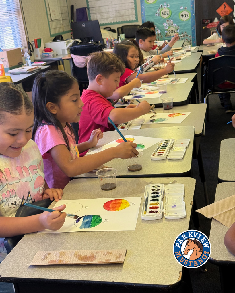 Mrs. Guerrero’s 1st graders painting