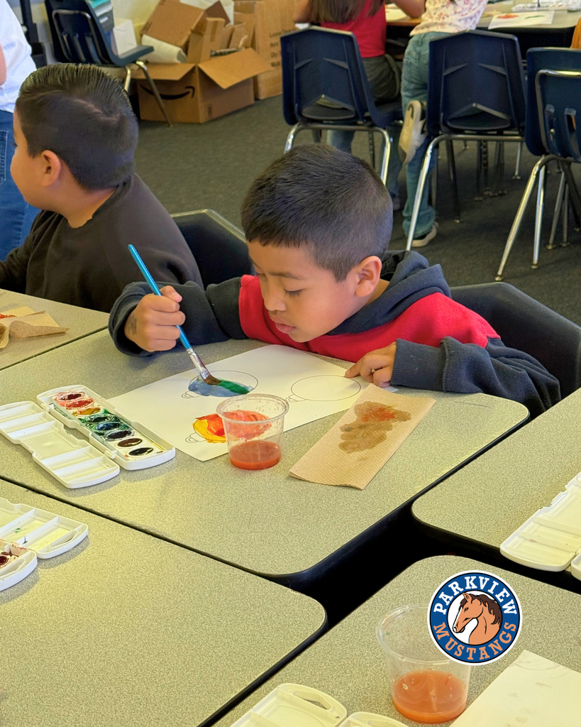 Mrs. Guerrero’s 1st graders painting