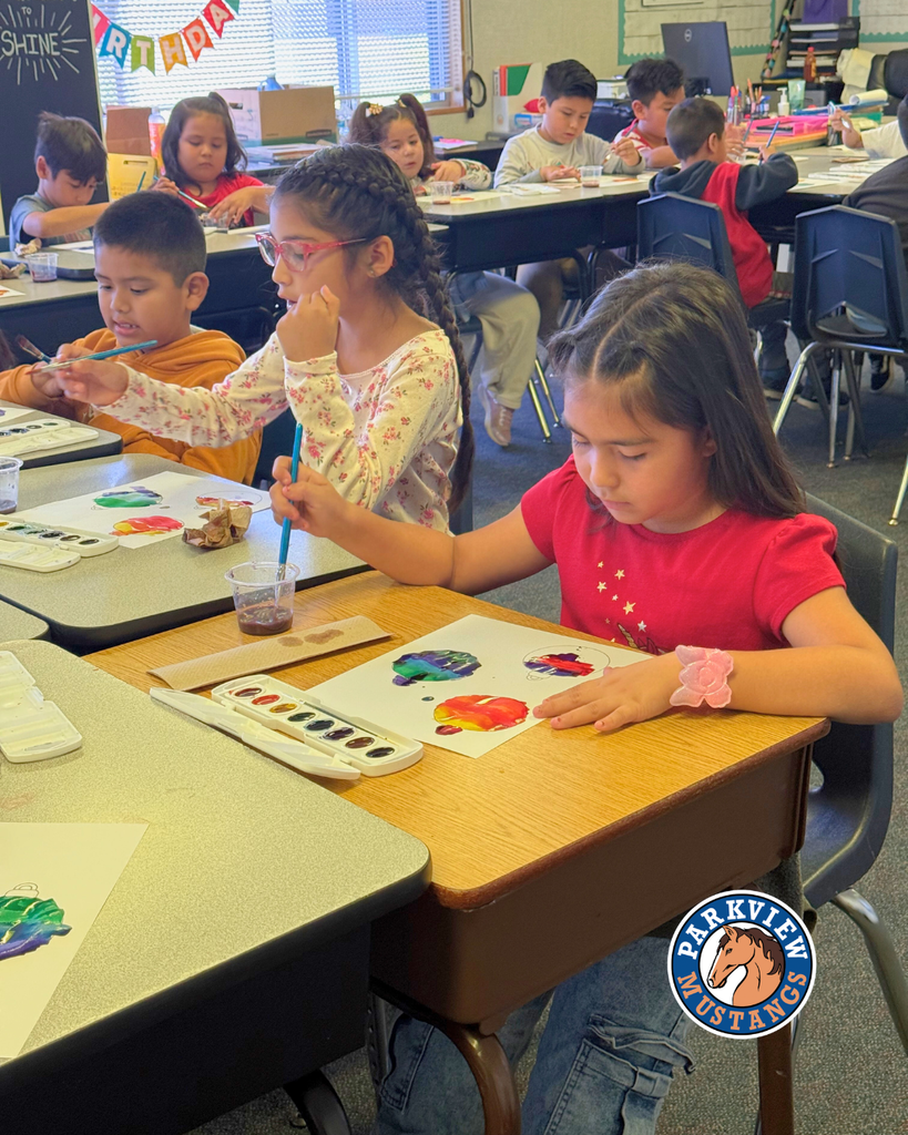 Mrs. Guerrero’s 1st graders painting