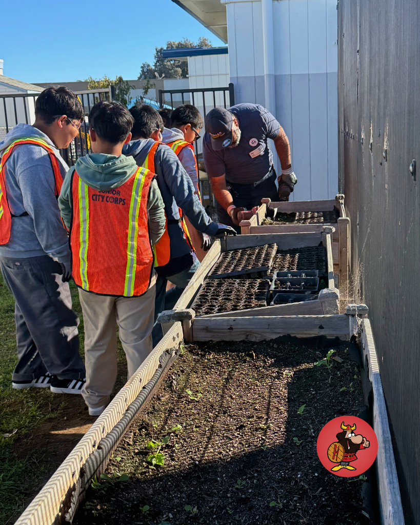 Junior City Corps, a group of 5th graders teamed up with Mr. Eddy to help restore the raised garden beds using sanders