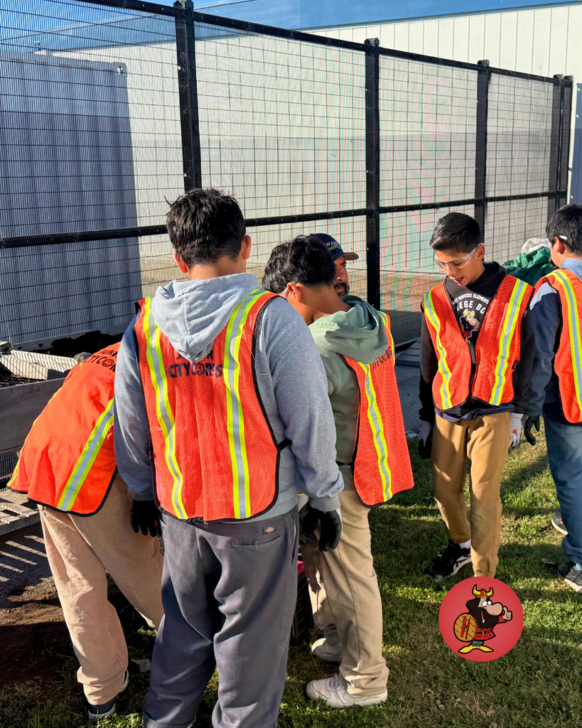 Junior City Corps, a group of 5th graders teamed up with Mr. Eddy to help restore the raised garden beds using sanders