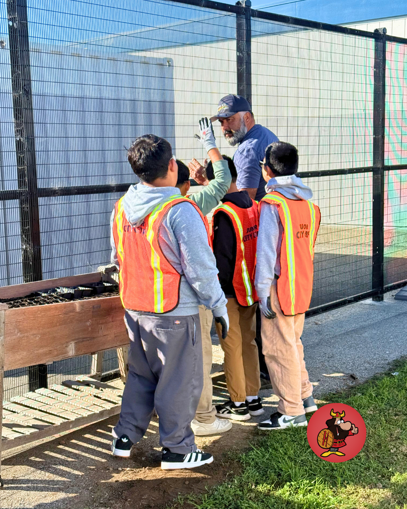 Junior City Corps, a group of 5th graders teamed up with Mr. Eddy to help restore the raised garden beds using sanders