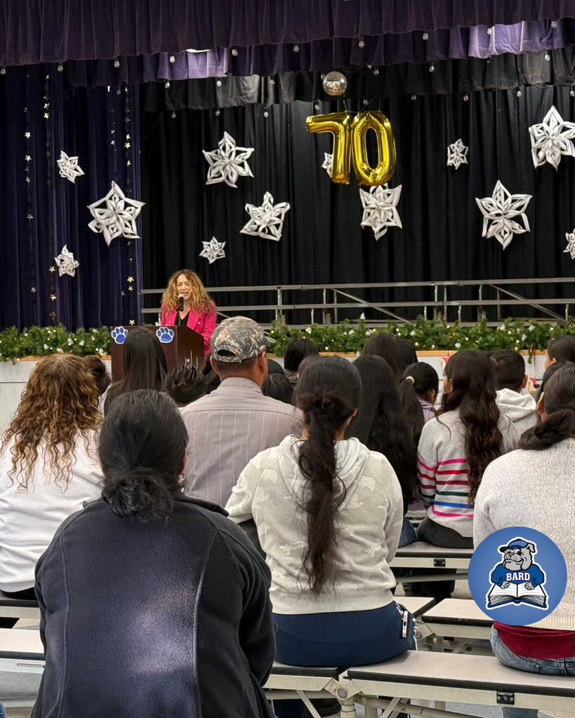 teacher announcing award winners