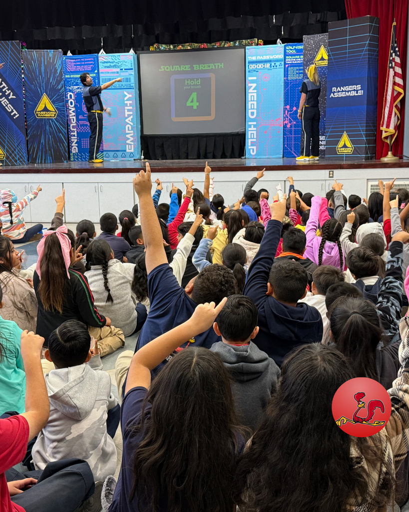 kids raising hand to participate