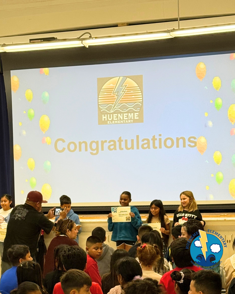 students pose for photo