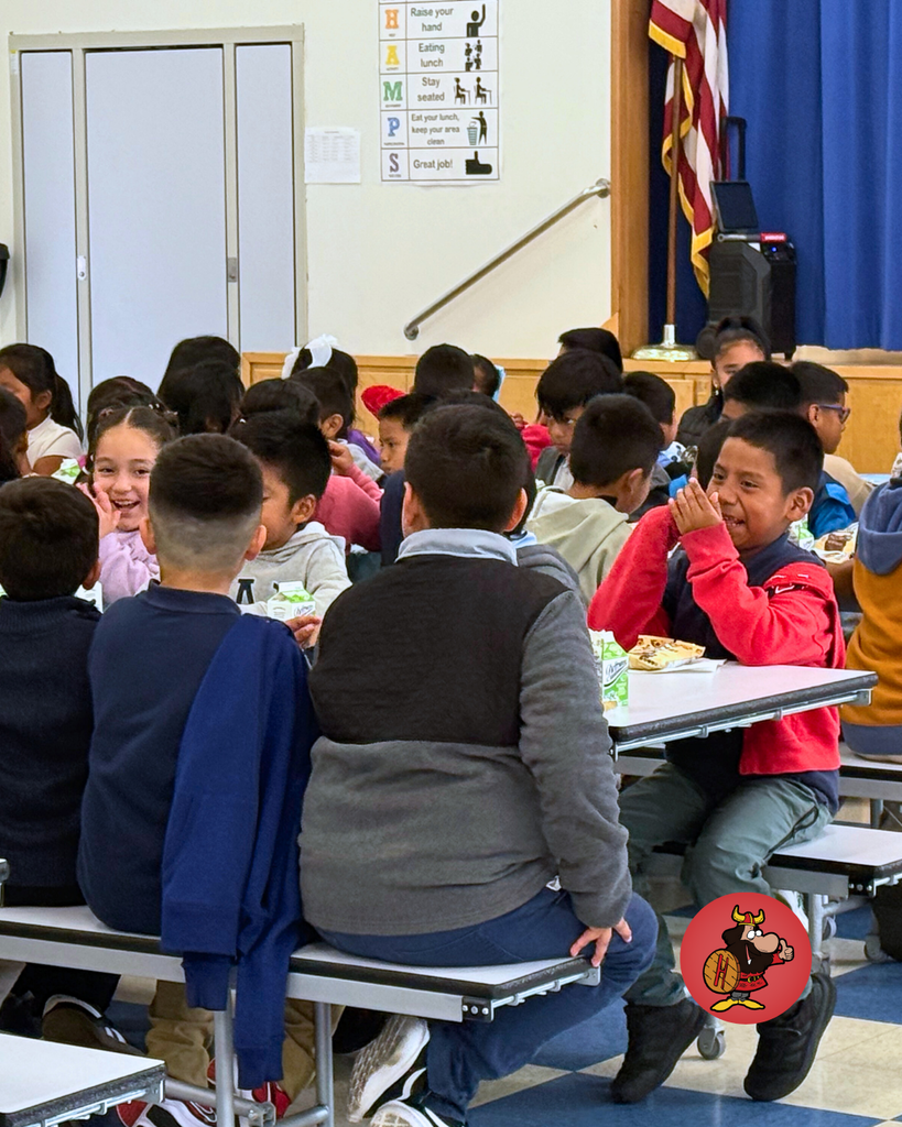 student giving santa a high five