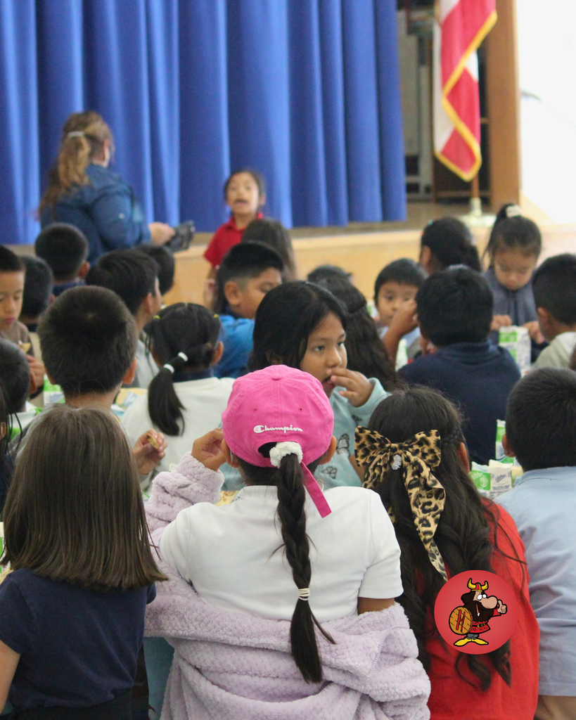 student giving santa a high five