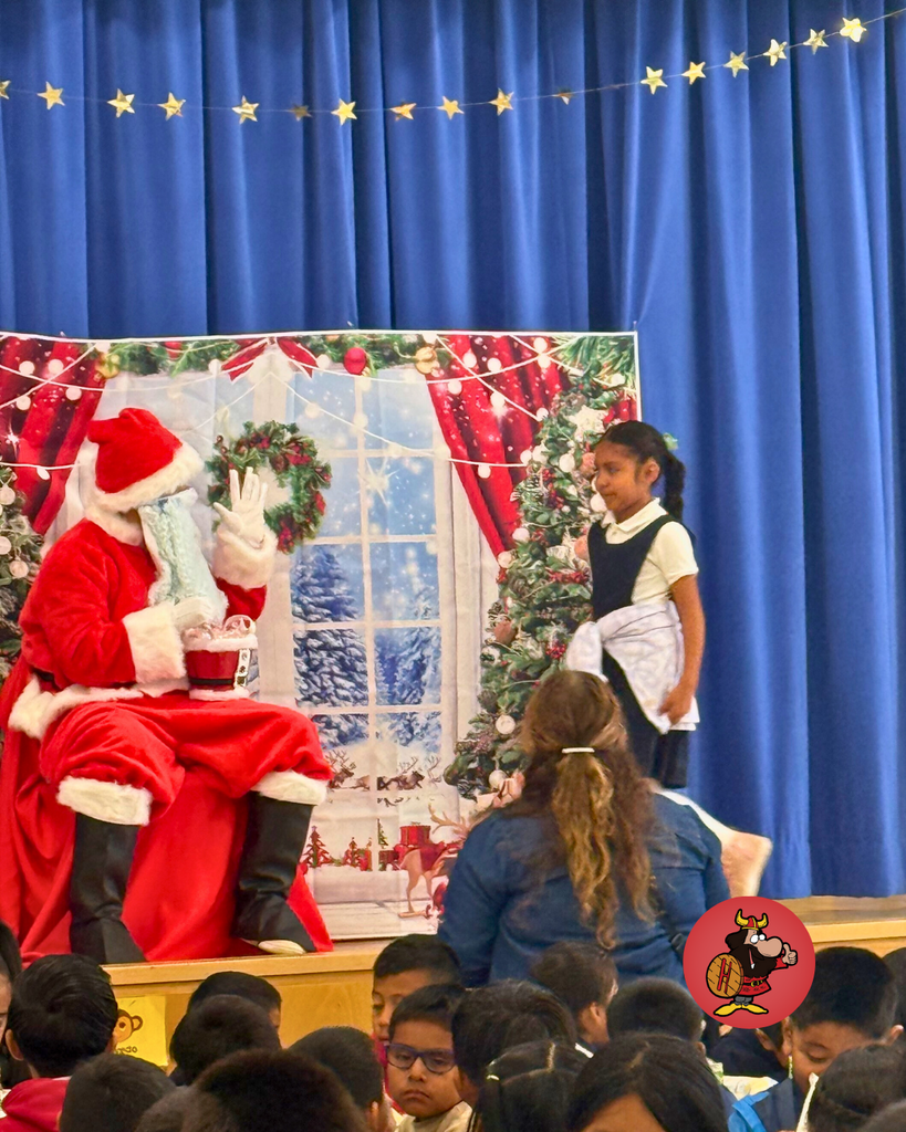 student giving santa a high five