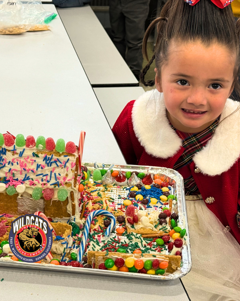 students enjoyed a festive Gingerbread House Family Activity