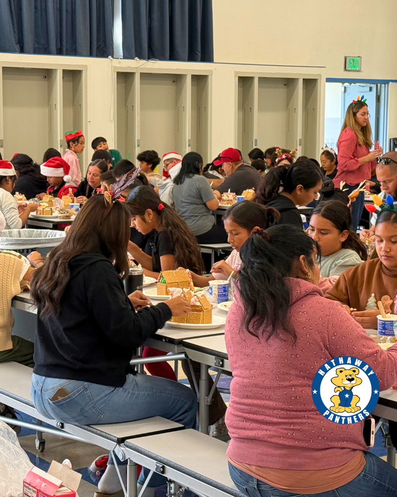 students creating Gingerbread Houses
