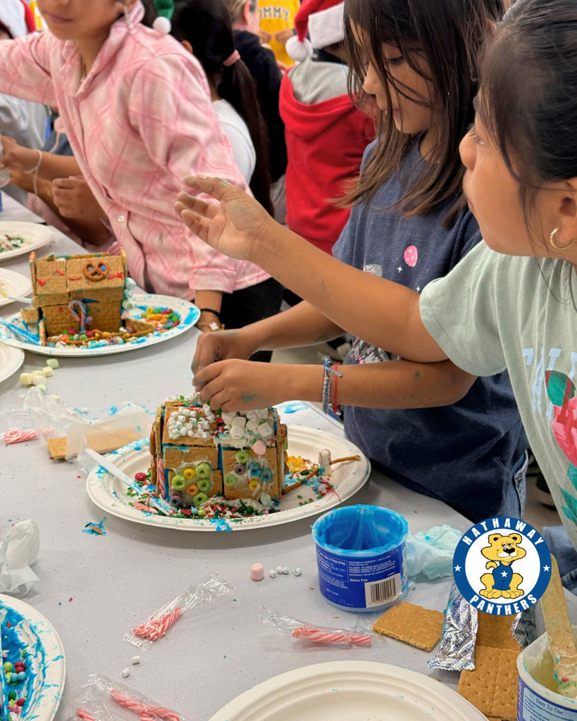 students creating Gingerbread Houses