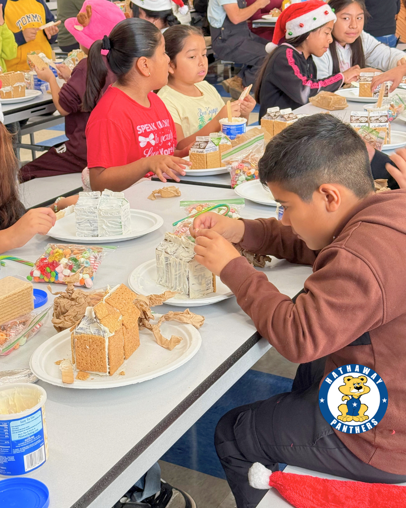 students creating Gingerbread Houses