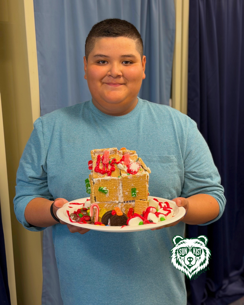 students creating Gingerbread Houses