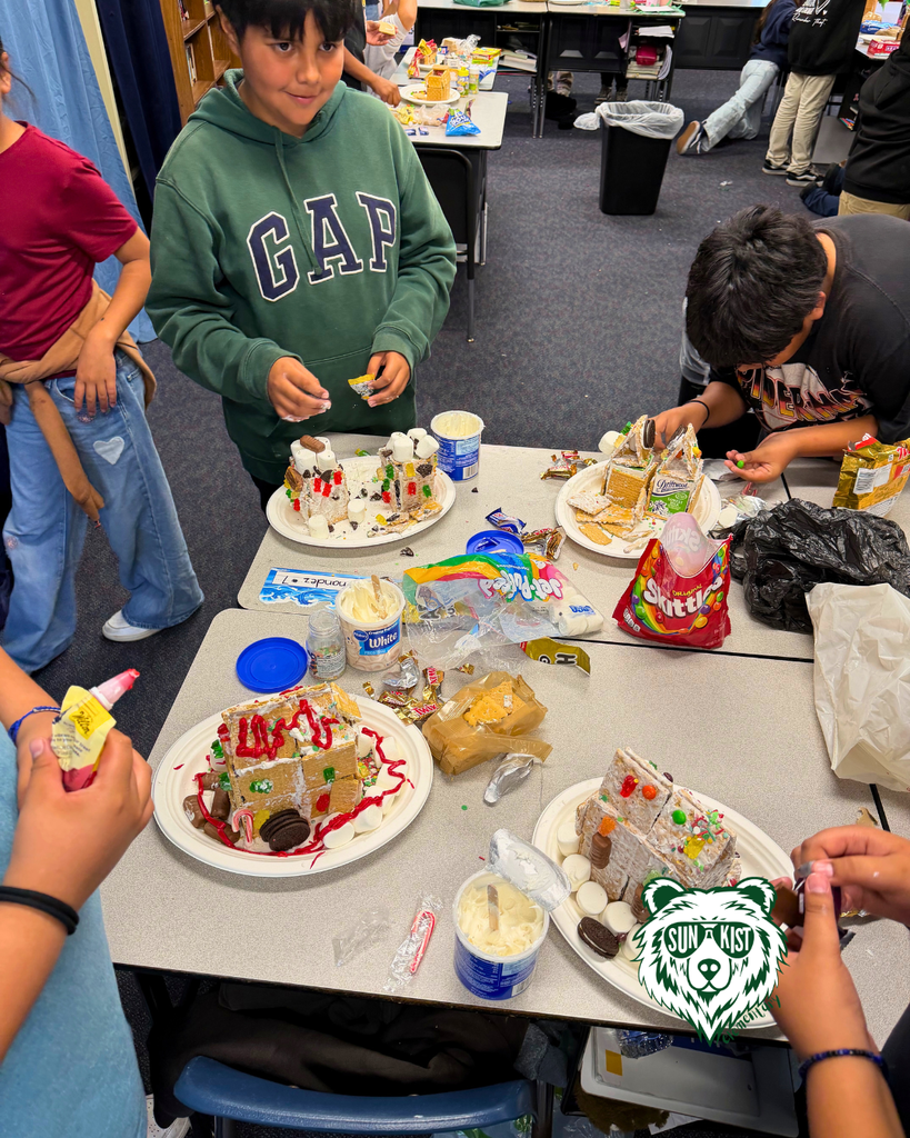 students creating Gingerbread Houses