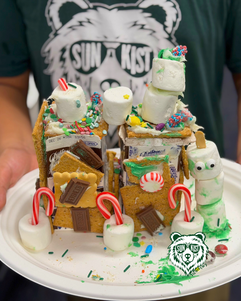 students creating Gingerbread Houses