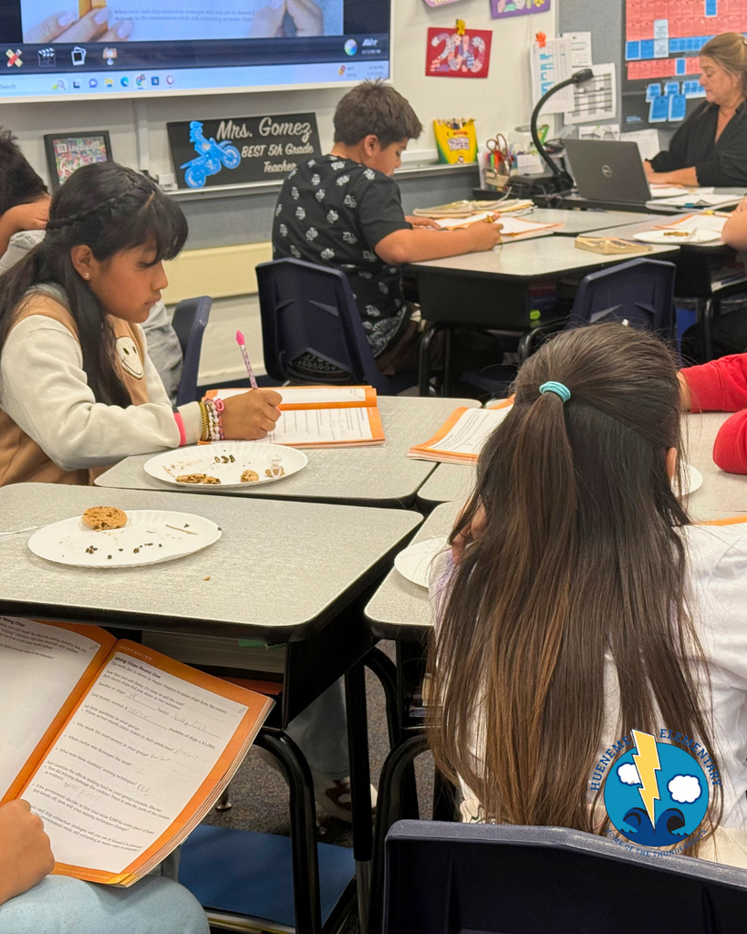 student participating in mining activity, mining a cookie