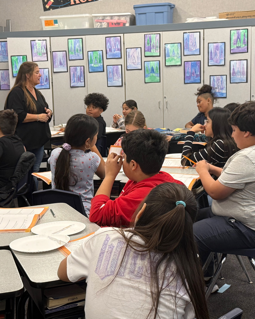 student participating in mining activity, mining a cookie