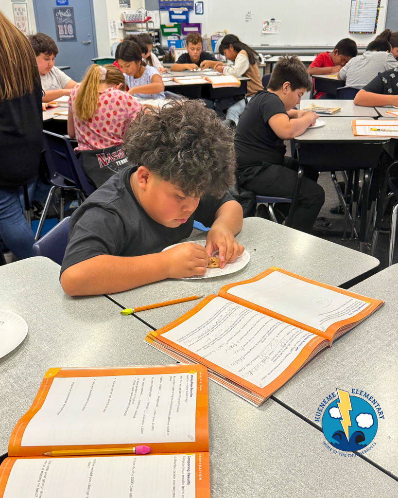 student participating in mining activity, mining a cookie
