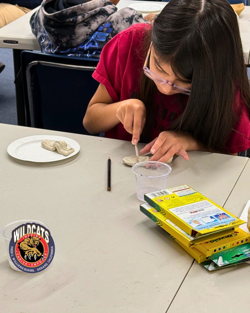 students sculpting an egg and a piece of bacon