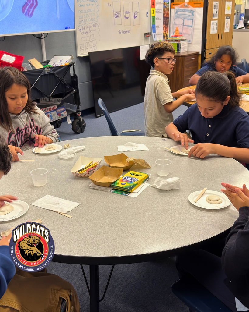 students sculpting an egg and a piece of bacon