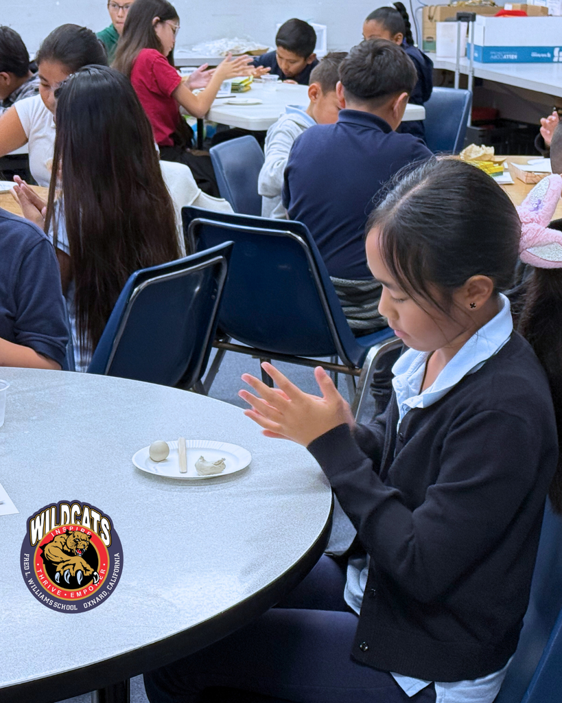 students sculpting an egg and a piece of bacon