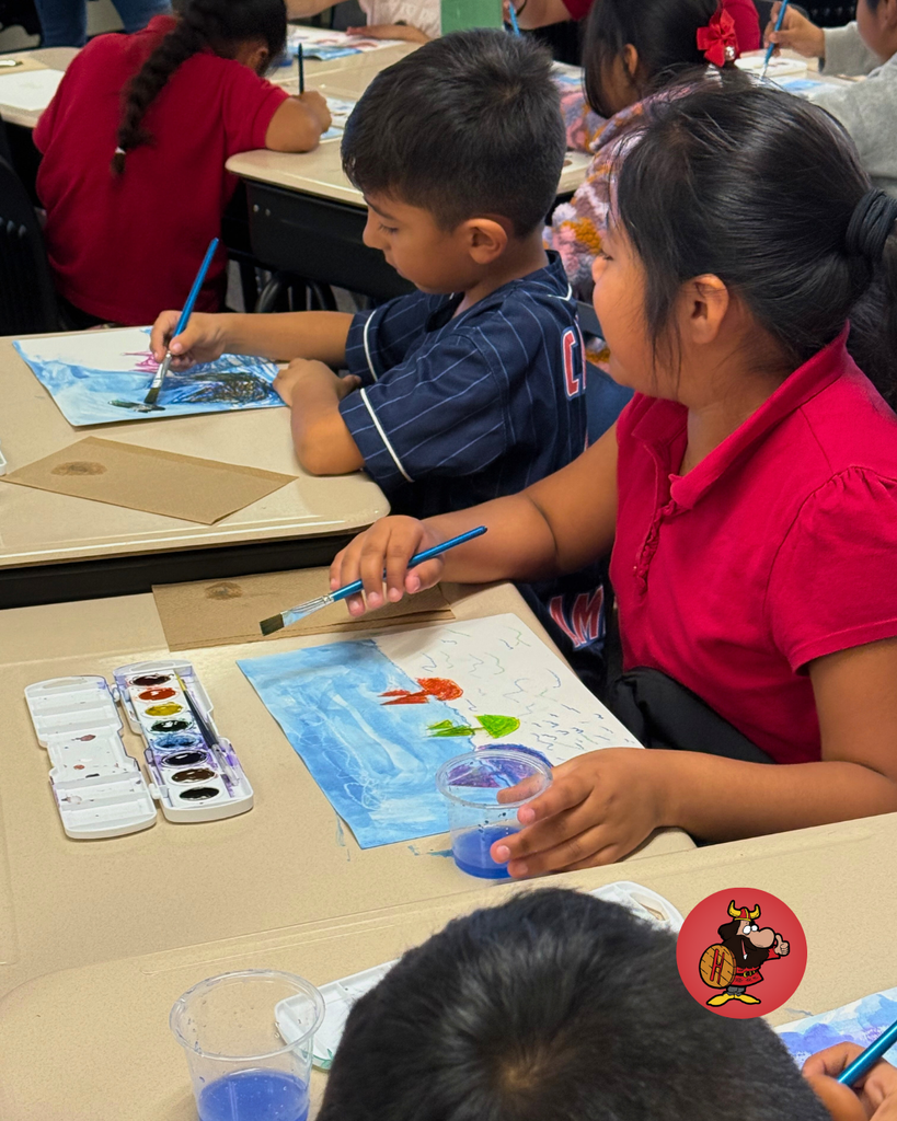 students participating in art project