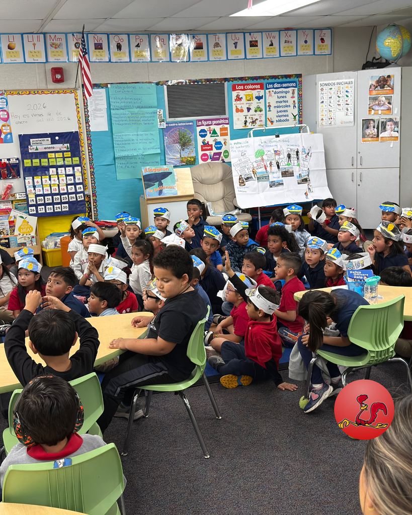 police officer answering students questions on community helper day