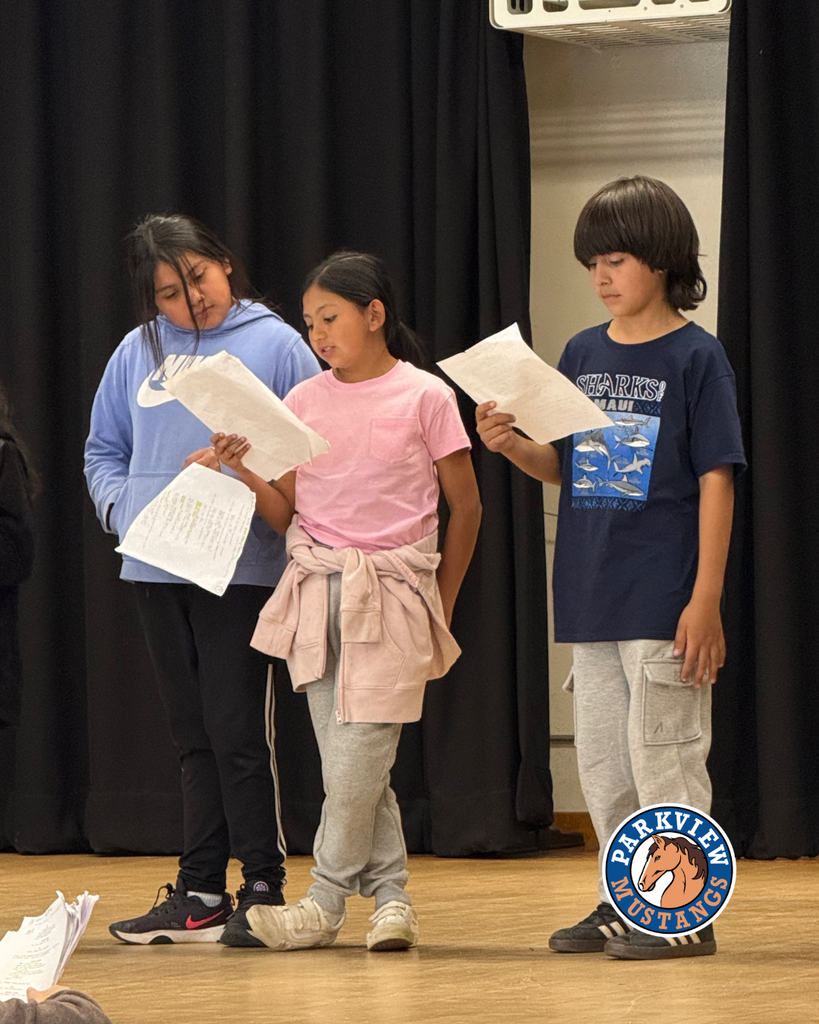 students acting out scenes from the Lorax