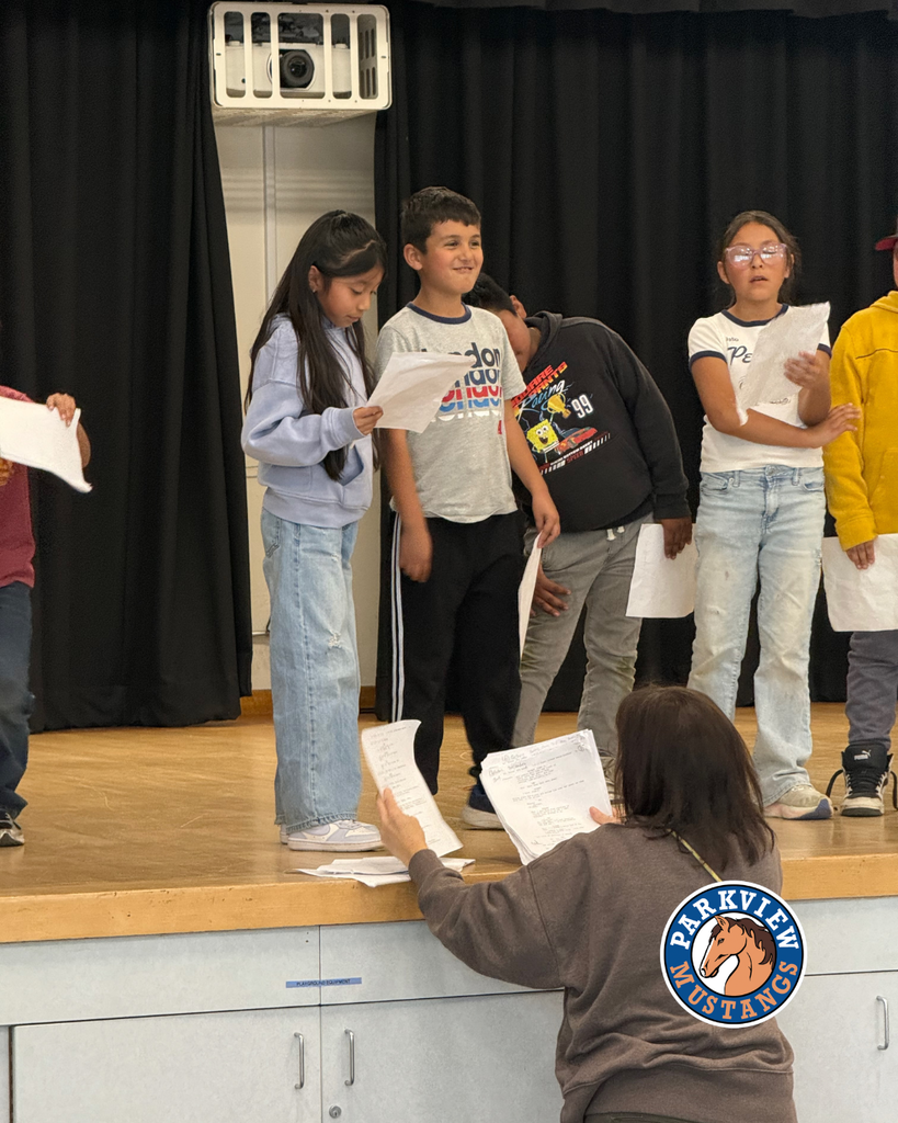 students acting out scenes from the Lorax