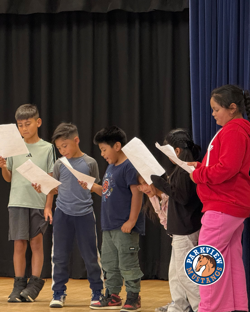 students acting out scenes from the Lorax