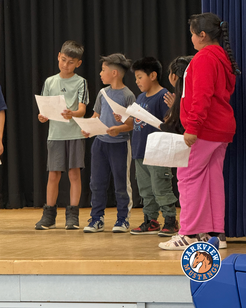 students acting out scenes from the Lorax