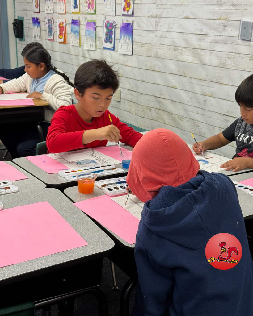 student participating in art class