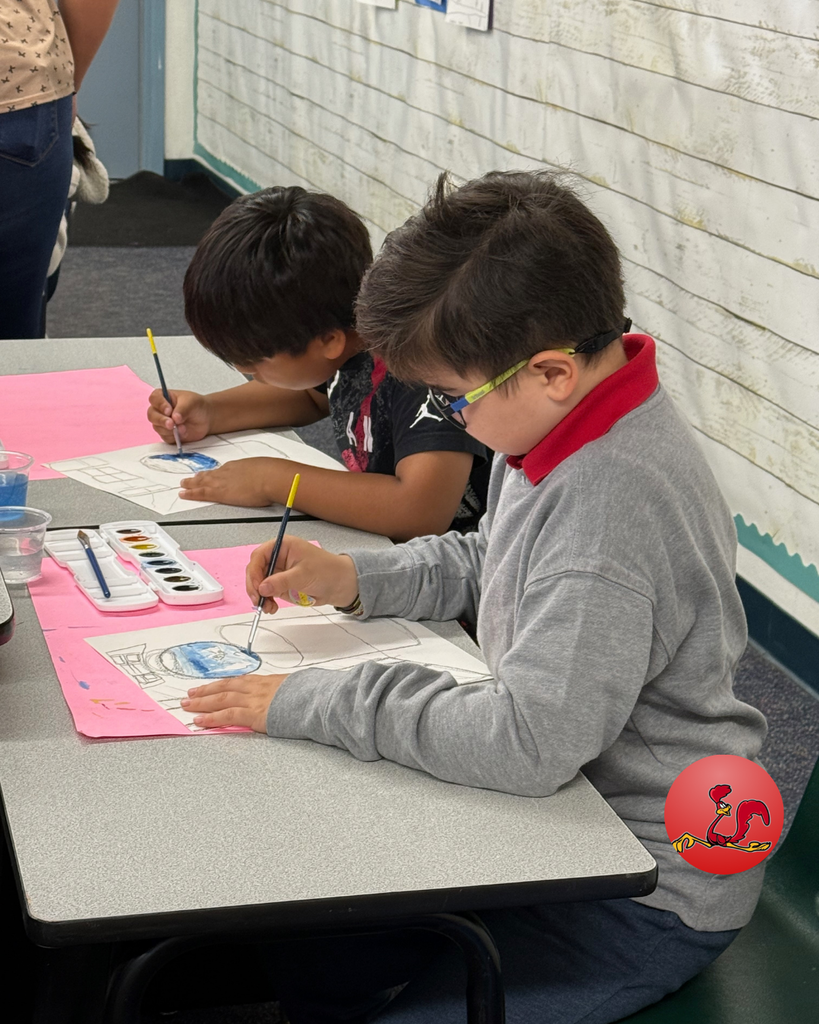 student participating in art class