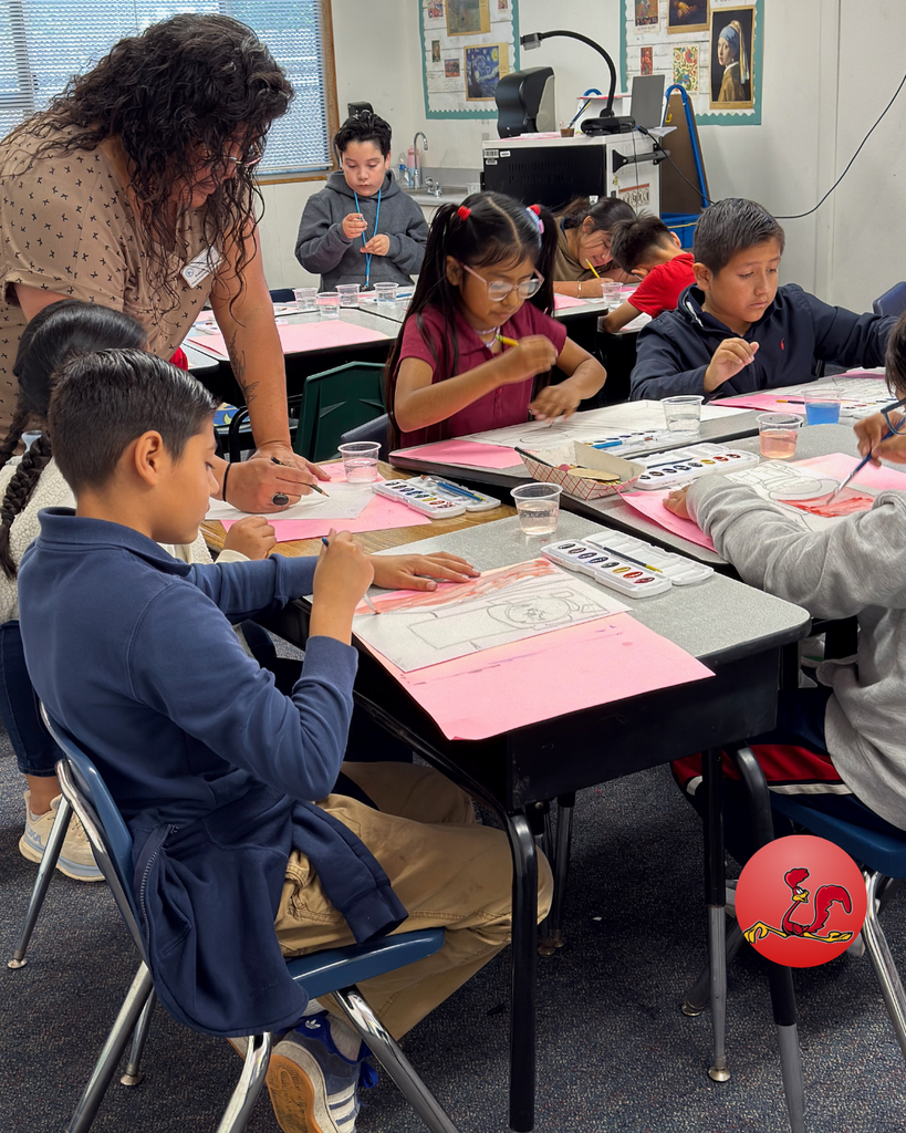 student participating in art class