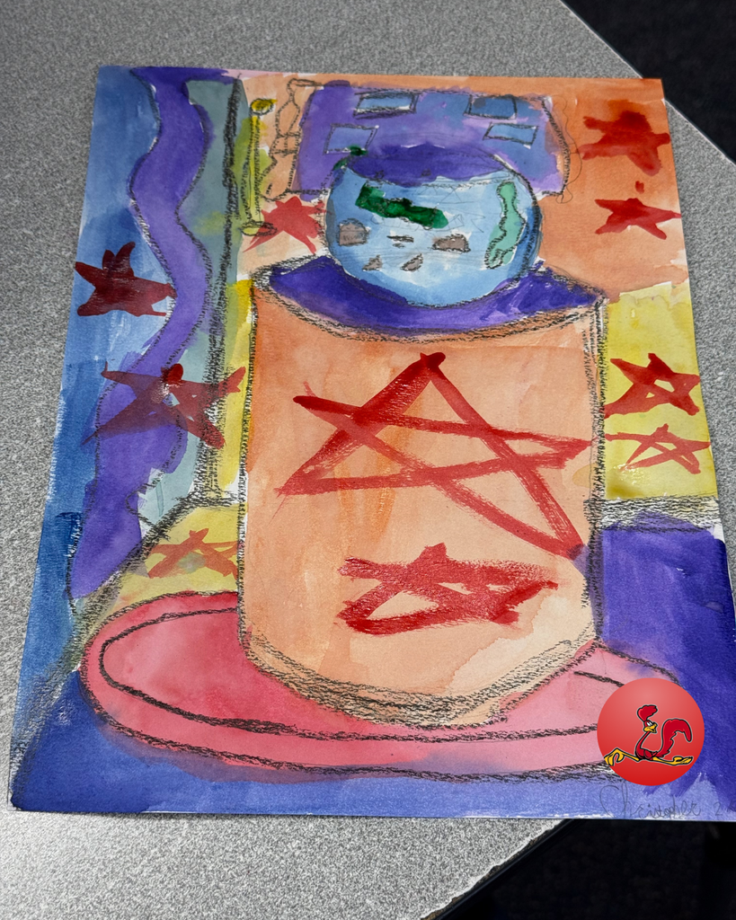 student participating in art class