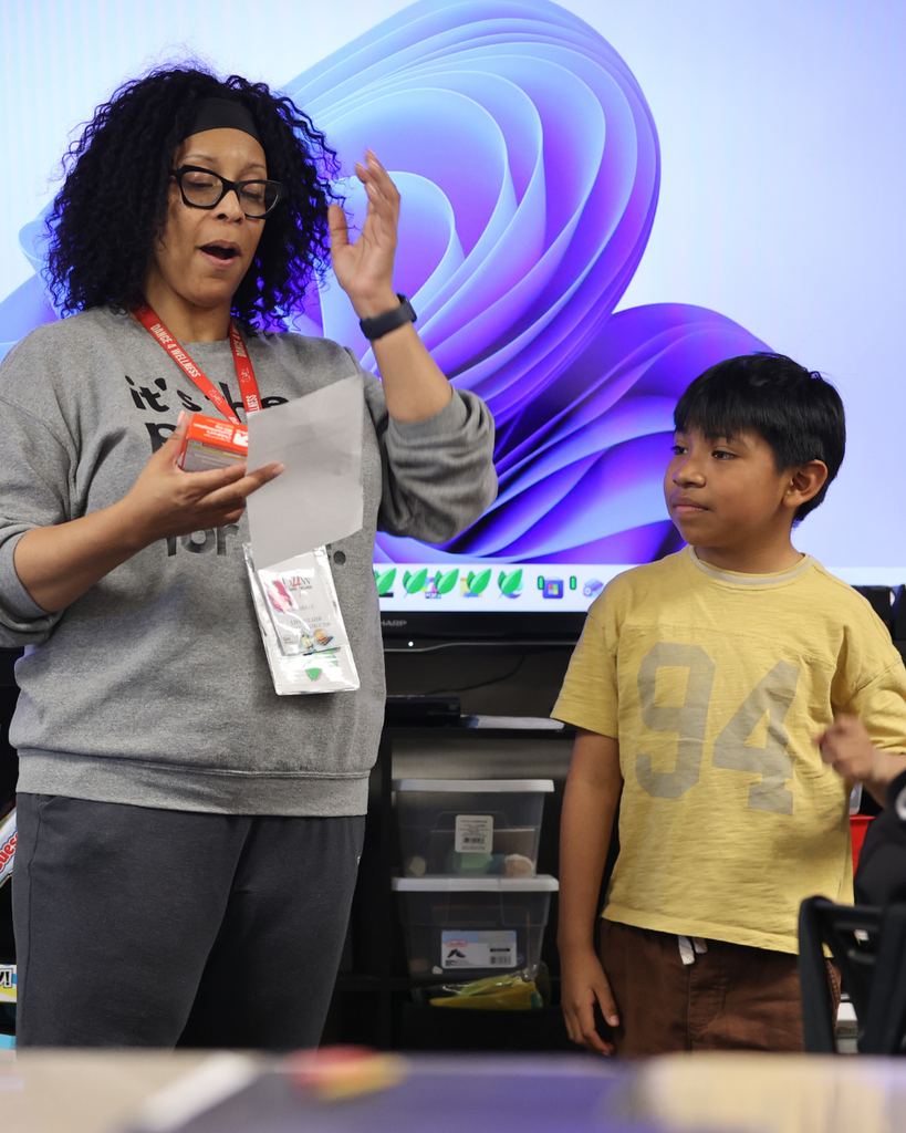 students practicing performing in theater class