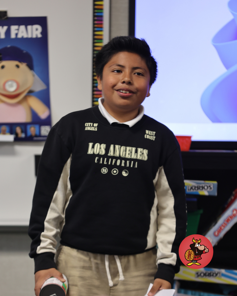 students practicing performing in theater class